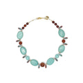 Collar Barlovento – TideStone, collar artesanal de howlita turquesa y granate hecho a mano en España